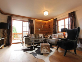 Гостиница Unique and exclusively furnished chalet near the ski lift  Миттерзилль